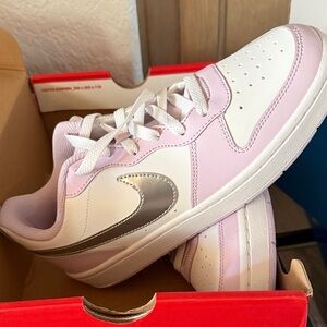Nike White and Pink Shoes with Metallic Swoosh